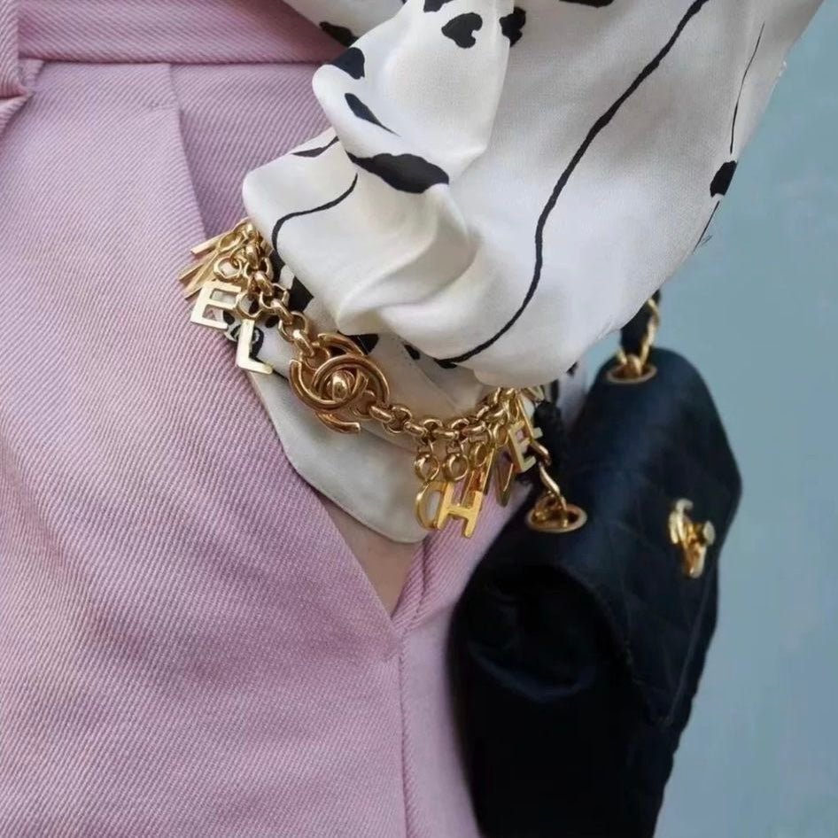 Chanel 1996 Vintage Letter Logo Turnlock Bracelet